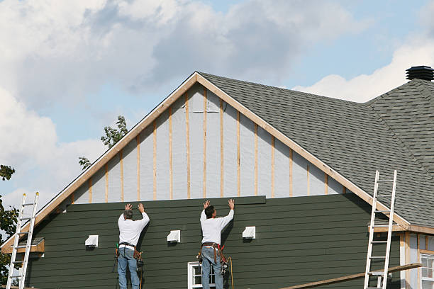 Professional Siding Installation technician working in Hurdle Mills, NC